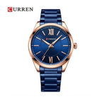 CURREN 8423 Reloj Clásico en Acero color Azul y Oro Rosa / Azul
